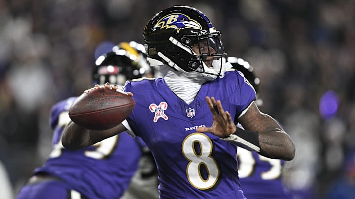 Dec 21, 2024; Baltimore, Maryland, USA;  Baltimore Ravens quarterback Lamar Jackson (8) throws from the pocket during the first half against the Pittsburgh Steelers at M&T Bank Stadium. Mandatory Credit: Tommy Gilligan-Imagn Images