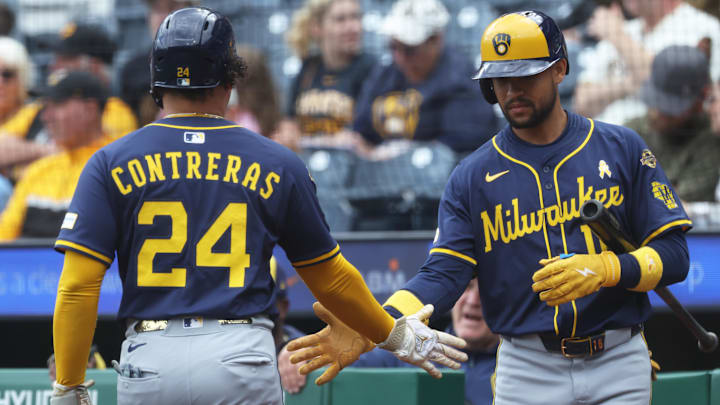 Sep 7, 2025; Pittsburgh, Pennsylvania, USA; Milwaukee Brewers center fielder Blake Perkins (16) greets designated hitter William Contreras (24) crossing home plate to score a run against the Pittsburgh Pirates during the first inning at PNC Park. Mandatory Credit: Charles LeClaire-Imagn Images Sep 7, 2025; Pittsburgh, Pennsylvania, USA; Milwaukee Brewers center fielder Blake Perkins (16) greets designated hitter William Contreras (24) crossing home plate to score a run against the Pittsburgh Pirates during the first inning at PNC Park. Mandatory Credit: Charles LeClaire-Imagn Images