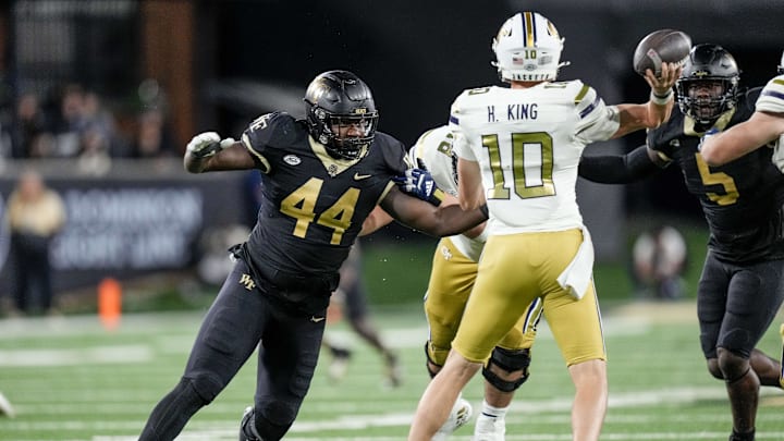 Sep 23, 2023; Winston-Salem, North Carolina, USA; Wake Forest Demon Deacons defensive lineman Justin Williams (44) pressures Georgia Tech Yellow Jackets quarterback Haynes King (10) during the second half at Allegacy Federal Credit Union Stadium. Mandatory Credit: Jim Dedmon-Imagn Images Sep 23, 2023; Winston-Salem, North Carolina, USA; Wake Forest Demon Deacons defensive lineman Justin Williams (44) pressures Georgia Tech Yellow Jackets quarterback Haynes King (10) during the second half at Allegacy Federal Credit Union Stadium. Mandatory Credit: Jim Dedmon-Imagn Images