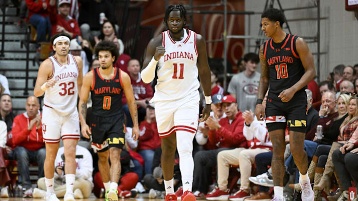 Jan 26, 2025; Bloomington, Indiana, USA; Indiana Hoosiers center Oumar Ballo (11) celebrates after forcing a turnover against Maryland Terrapins forward Julian Reese (10) during the first half at Simon Skjodt Assembly Hall. Mandatory Credit: Robert Goddin-Imagn Images