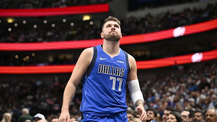 Dallas Mavericks guard Luka Doncic (77) reacts during the first quarter against the Utah Jazz at the American Airlines Center. 
