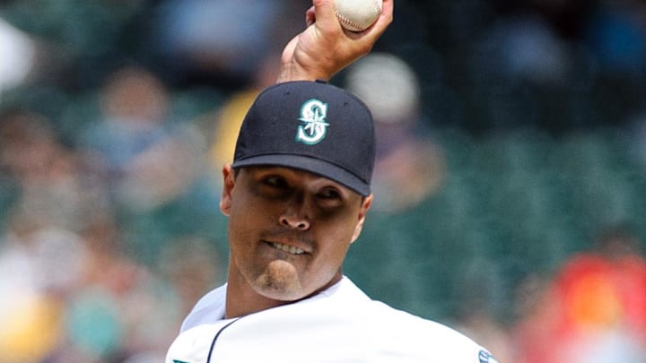 Seattle Mariners relief pitcher Brandon League (43) pitches to the Kansas City Royals during the 8th inning at Safeco Field. Seattle defeated Kansas City 7-6 in 2012.