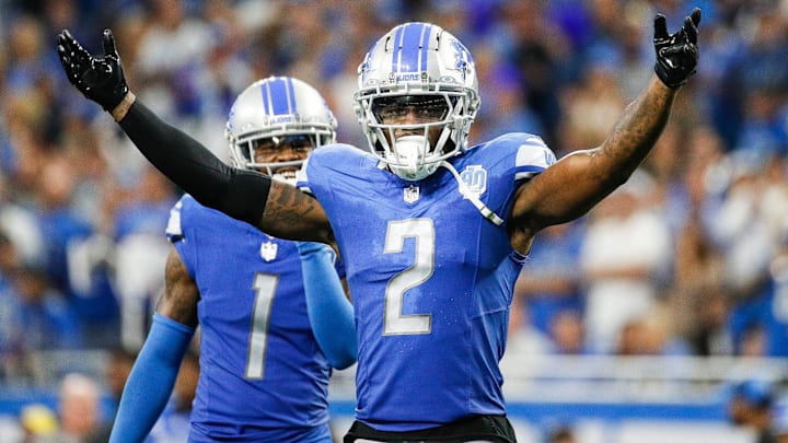 Detroit Lions safety  (2) waves at the crowd during the second half against