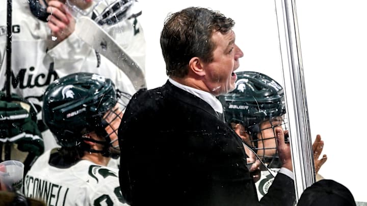 Michigan State's head coach Adam Nightingale calls out to players during the first period against Notre Dame in the Big Ten tournament on Saturday, March 15, 2025, at Muni Arena in East Lansing.