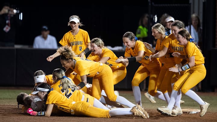 Wicksburg players pile up in celebration during the AHSAA class 3A softball state championship at Choccolocco Park in Oxford, Ala., on Wednesday, May 14, 2025. Wicksburg defeated Saint James 4-3 to win the state championship