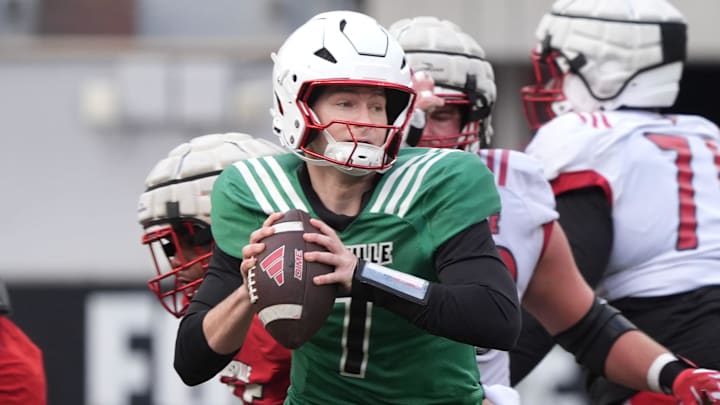 Louisville Miller Moss (7) runs and then throws the ball against Red Louisville in the Spring Game Friday night at L & N Stadium.
April 11, 2025 Louisville Miller Moss (7) runs and then throws the ball against Red Louisville in the Spring Game Friday night at L & N Stadium.
April 11, 2025