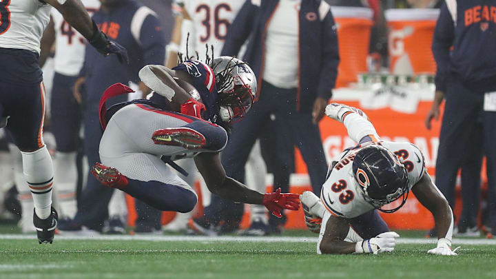 Jaylon Johnson makes a hit on Rhamondre Stevenson to bring down the Patriots back in the open field in a 2022 Bears win. Jaylon Johnson makes a hit on Rhamondre Stevenson to bring down the Patriots back in the open field in a 2022 Bears win.
