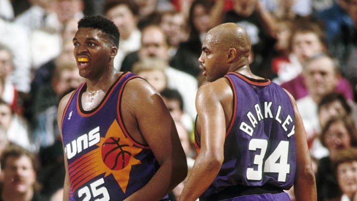 Unknown date 1992; Portland, OR, USA: FILE PHOTO; Phoenix Suns forward Charles Barkley (34) talks to Oliver Miller (25) against the Portland Trail Blazers at Memorial Coliseum. Mandatory Credit: USA TODAY Sports
