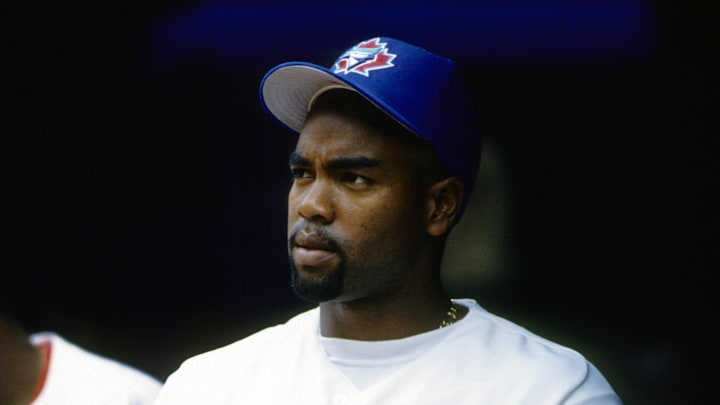 Jun 21, 1997; Toronto, ON, CANADA; FILE PHOTO; Toronto Blue Jays infielder Carlos Delgado (25) in the dugout against the Baltimore Orioles at the Skydome. Mandatory Credit: Imagn Images Jun 21, 1997; Toronto, ON, CANADA; FILE PHOTO; Toronto Blue Jays infielder Carlos Delgado (25) in the dugout against the Baltimore Orioles at the Skydome. Mandatory Credit: Imagn Images
