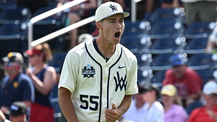 Jun 12, 2026; Omaha, NE, USA;  West Virginia Mountaineers pitcher Ben McDougal (55) reacts after the win Troy Trojans at Charles Schwab Field. Mandatory Credit: Steven Branscombe-Imagn Images