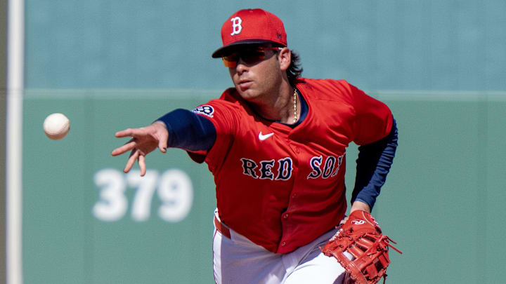 Boston Res Sox Triston Casas (36) flips the ball to first base for the out in the fourth inning off their game with the Toronto Blue Jays at JetBlue Park at Fenway South in 2025.