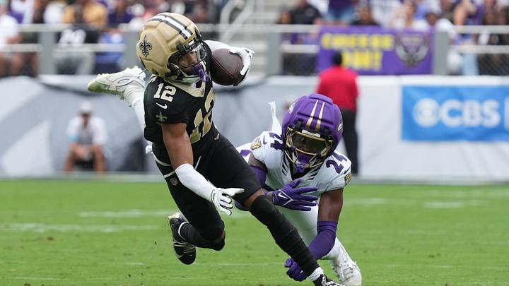 Sep 20, 2026; Baltimore, Maryland, USA; New Orleans Saints wide receiver Chris Olave (12) is brought down by Baltimore Ravens safety Malaki Starks (24) in the fourth quarter at M&T Bank Stadium. Mandatory Credit: James Lang-Imagn Images Sep 20, 2026; Baltimore, Maryland, USA; New Orleans Saints wide receiver Chris Olave (12) is brought down by Baltimore Ravens safety Malaki Starks (24) in the fourth quarter at M&T Bank Stadium. Mandatory Credit: James Lang-Imagn Images