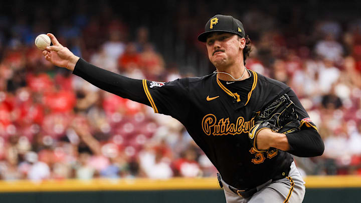 Sep 22, 2024; Cincinnati, Ohio, USA; Pittsburgh Pirates starting pitcher Paul Skenes (30) pitches against the Cincinnati Reds in the third inning at Great American Ball Park. Mandatory Credit: Katie Stratman-Imagn Images