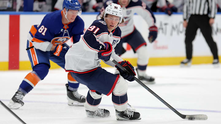 Mar 22, 2026; Elmont, New York, USA; Columbus Blue Jackets center Kent Johnson (91) controls the puck against New York Islanders left wing Ondrej Palat (81) during the third period at UBS Arena. Mandatory Credit: Brad Penner-Imagn Images Mar 22, 2026; Elmont, New York, USA; Columbus Blue Jackets center Kent Johnson (91) controls the puck against New York Islanders left wing Ondrej Palat (81) during the third period at UBS Arena. Mandatory Credit: Brad Penner-Imagn Images
