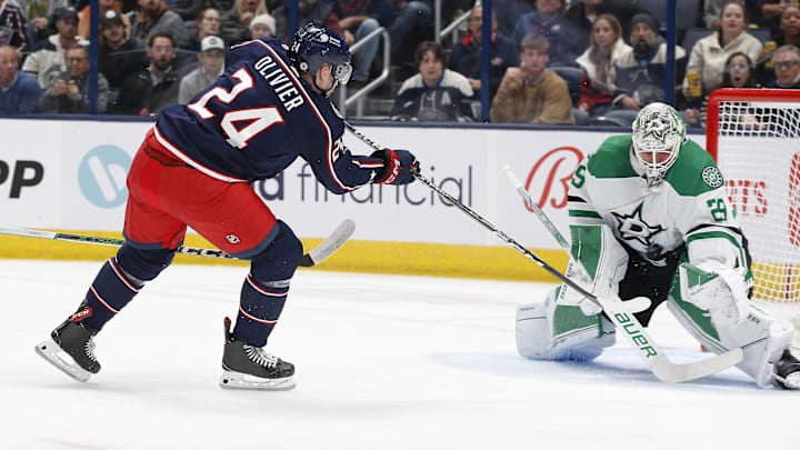 Nov 9, 2023; Columbus, Ohio, USA; Dallas Stars goalie Jake Oettinger (29) makes a save on the shot from Columbus Blue Jackets right wing Mathieu Olivier (24) during the first period at Nationwide Arena. Mandatory Credit: Russell LaBounty-Imagn Images