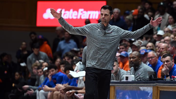 Dec 2, 2025; Durham, North Carolina, USA; Florida Gators head coach Todd Golden reacts during the first half against the Duke Blue Devils at Cameron Indoor Stadium. 