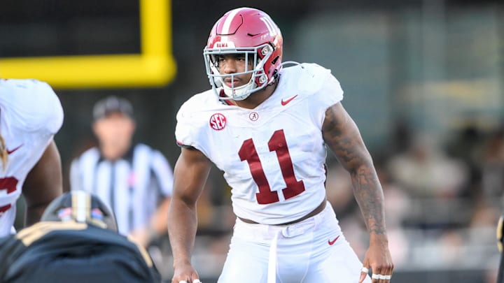 Oct 5, 2024; Nashville, Tennessee, USA; Alabama Crimson Tide linebacker Jihaad Campbell (11) sneaks a peek into the back field against the Vanderbilt Commodores during the second half at FirstBank Stadium. Oct 5, 2024; Nashville, Tennessee, USA; Alabama Crimson Tide linebacker Jihaad Campbell (11) sneaks a peek into the back field against the Vanderbilt Commodores during the second half at FirstBank Stadium.