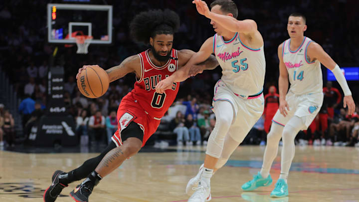 Mar 8, 2025; Miami, Florida, USA; Chicago Bulls guard Coby White (0) drives to the basket