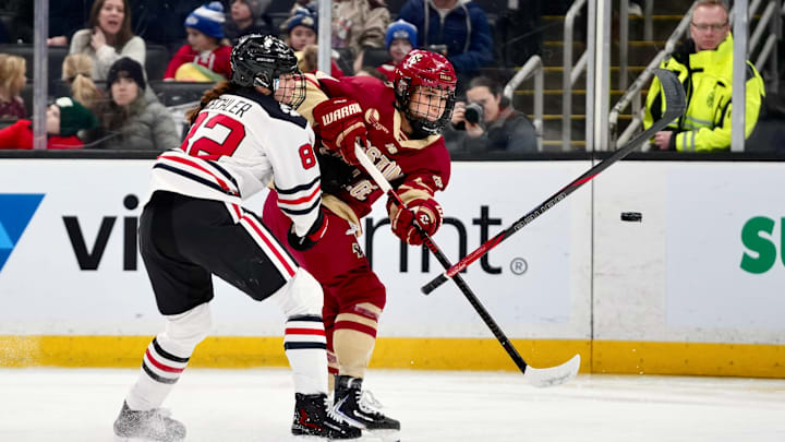 Emma Conner hits Alessia Baechler's stick out of her hands while firing a shot at TD Garden on Jan. 20, 2026.