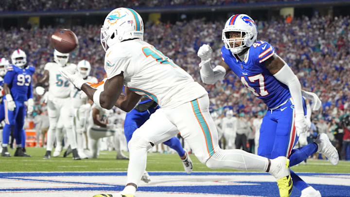 Miami Dolphins WR Tyreek Hill makes a catch to score a touchdown against Buffalo Bills CB Christian Benford. Miami Dolphins WR Tyreek Hill makes a catch to score a touchdown against Buffalo Bills CB Christian Benford.