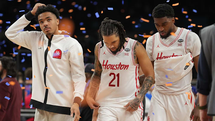 Apr 7, 2025; San Antonio, TX, USA; Houston Cougars guard Emanuel Sharp (21) and teammates walk off the court after losing to the Florida Gators in the national championship game of the Final Four of the 2025 NCAA Tournament at the Alamodome. Apr 7, 2025; San Antonio, TX, USA; Houston Cougars guard Emanuel Sharp (21) and teammates walk off the court after losing to the Florida Gators in the national championship game of the Final Four of the 2025 NCAA Tournament at the Alamodome.