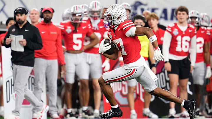 Ohio State Buckeyes wide receiver Carnell Tate (17) runs after a catch during the Cotton Bowl at AT&T Stadium in Arlington, Texas for the College Football Playoff quarterfinal game against the Miami Hurricanes on Dec. 31, 2025. Ohio State lost 24-14. Ohio State Buckeyes wide receiver Carnell Tate (17) runs after a catch during the Cotton Bowl at AT&T Stadium in Arlington, Texas for the College Football Playoff quarterfinal game against the Miami Hurricanes on Dec. 31, 2025. Ohio State lost 24-14.