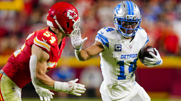 Kansas City's Leo Chenal attempts to tackle  Amon-Ra St. Brown. Chenal is a free agent who would fit in well with the Bears.