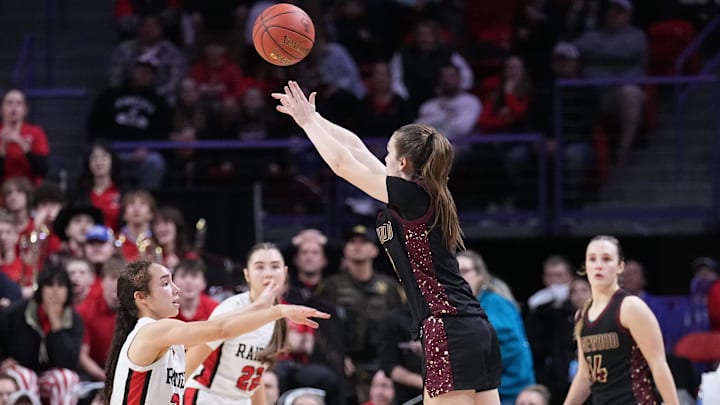 Edgewood's Anna Miller (30) launches a last-second shot, in triple overtime, against Wauwatosa East during the WIAA Division 2 state championship game on March 15, 2025, at the Resch Center in Green Bay, Wis. The shot was unsuccessful, giving Wauwatosa East a 59-58 victory.
