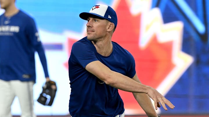Toronto Blue Jays pitcher Chris Bassitt (40) throws the ball during workouts for the American League Championship Series at Rogers Centre. Toronto Blue Jays pitcher Chris Bassitt (40) throws the ball during workouts for the American League Championship Series at Rogers Centre.