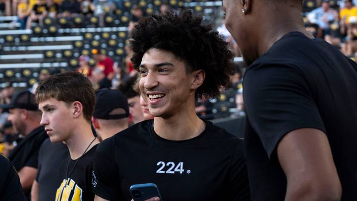 Cayden Daughtry, a men’s basketball Class of 2027 recruit, talks to Cam Manyawu during a visit to Iowa ahead of the Cy-Hawk football game Sept. 12, 2026 at Kinnick Stadium in Iowa City, Iowa.