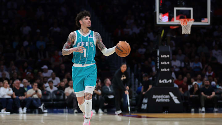 Oct 28, 2025; Miami, Florida, USA; Charlotte Hornets guard Lamelo Ball (1) dribbles the basketball against the Miami Heat during the second quarter at Kaseya Center. Mandatory Credit: Sam Navarro-Imagn Images