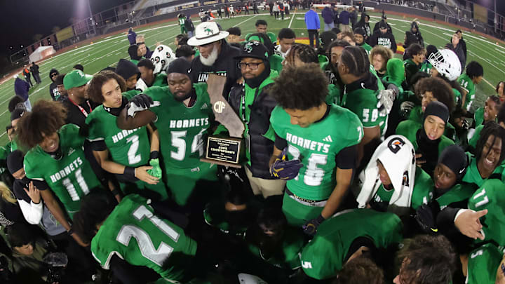 Lincoln players celebrate their second state title in three years at Saddleback College in Mission Viejo after winning CIF Division 1-AA title on Dec. 13, 2024 Lincoln players celebrate their second state title in three years at Saddleback College in Mission Viejo after winning CIF Division 1-AA title on Dec. 13, 2024