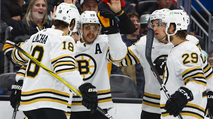Feb 26, 2024; Seattle, Washington, USA; Boston Bruins right wing David Pastrnak (88, middle)