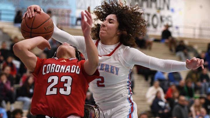 Monterey's Aaliyah Chavez blocks a shot by Coronado's Kamryn Hill in a District 3-5A girls basketball game Tuesday, Jan. 7, 2025, at Monterey High School.