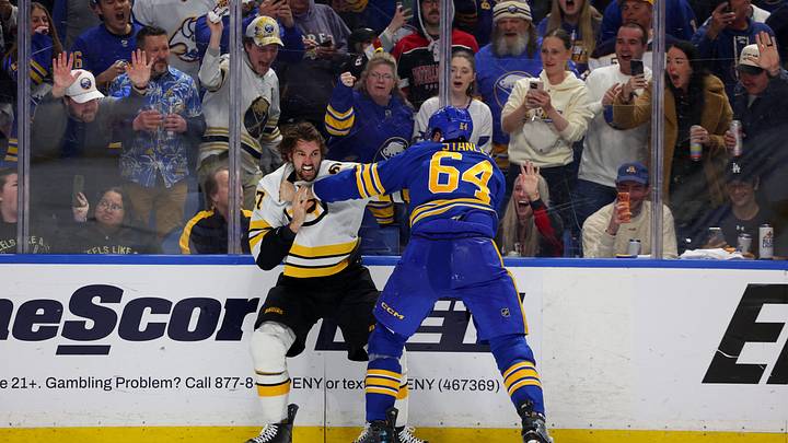 Apr 21, 2026; Buffalo, New York, USA; Boston Bruins center Mark Kastelic (47) and Buffalo Sabres defenseman Logan Stanley (64) fight during the third period in game two of the first round of the 2026 Stanley Cup Playoffs at KeyBank Center. Mandatory Credit: Timothy T. Ludwig-Imagn Images Apr 21, 2026; Buffalo, New York, USA; Boston Bruins center Mark Kastelic (47) and Buffalo Sabres defenseman Logan Stanley (64) fight during the third period in game two of the first round of the 2026 Stanley Cup Playoffs at KeyBank Center. Mandatory Credit: Timothy T. Ludwig-Imagn Images