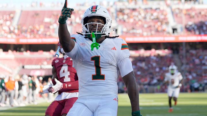 Sep 4, 2026; Stanford, California, USA;  Miami Hurricanes wide receiver Malachi Toney (1) reacts after scoring on a touchdown reception against the Stanford Cardinal during the first quarter at Stanford Stadium.  Mandatory Credit: Stan Szeto-Imagn Images