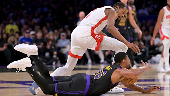 Apr 21, 2026; Los Angeles, California, USA;Los Angeles Lakers guard Marcus Smart (36) and Houston Rockets forward Kevin Durant (7) chase down a loose ball in the first half of game two of the first round of the 2026 NBA Playoffs against the Houston Rockets at Crypto.com Arena. Mandatory Credit: Jayne Kamin-Oncea-Imagn Images
