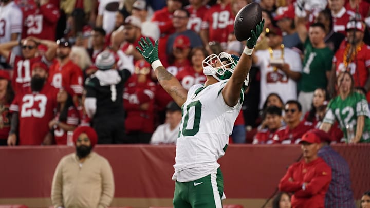 Allen Lazard celebrates after scoring a touchdown