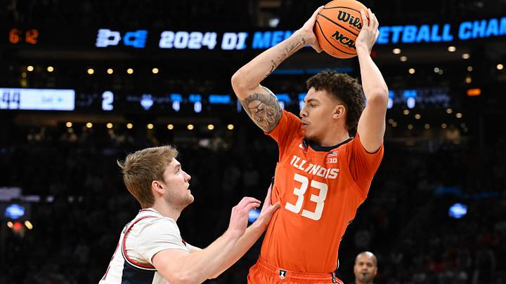 Mar 30, 2024; Boston, MA, USA; Illinois Fighting Illini forward Coleman Hawkins (33) attempts to dribble against the Connecticut Huskies in the finals of the East Regional of the 2024 NCAA Tournament at TD Garden. Mandatory Credit: Brian Fluharty-USA TODAY Sports Mar 30, 2024; Boston, MA, USA; Illinois Fighting Illini forward Coleman Hawkins (33) attempts to dribble against the Connecticut Huskies in the finals of the East Regional of the 2024 NCAA Tournament at TD Garden. Mandatory Credit: Brian Fluharty-USA TODAY Sports