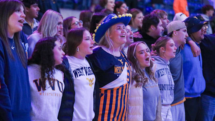 Nov 17, 2025; Morgantown, West Virginia, USA; West Virginia Mountaineers students sing “Country Roads” after defeating the Lafayette Leopards at WVU Coliseum. Mandatory Credit: Ben Queen-Imagn Images