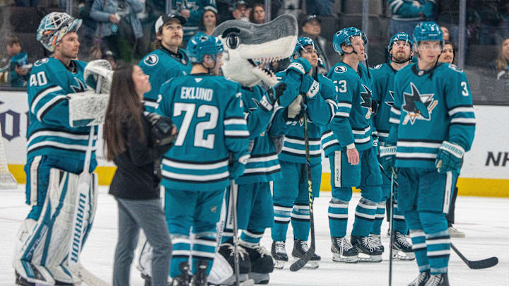 Apr 16, 2025; San Jose, California, USA;  San Jose Sharks left wing William Eklund (72) and San Jose Sharks goaltender Alexandar Georgiev (40) and San Jose Sharks center Ty Dellandrea (53) and teammates after the game against the Edmonton Oilers at SAP Center at San Jose. Mandatory Credit: Neville E. Guard-Imagn Images