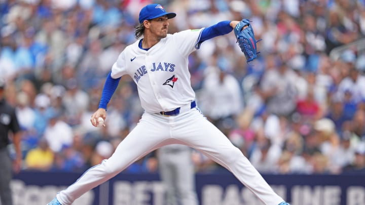 Jun 30, 2024; Toronto, Ontario, CAN; Toronto Blue Jays starting pitcher Kevin Gausman (34) throws a pitch game against the New York Yankees during the first inning at Rogers Centre. Mandatory Credit: Nick Turchiaro-USA TODAY Sports