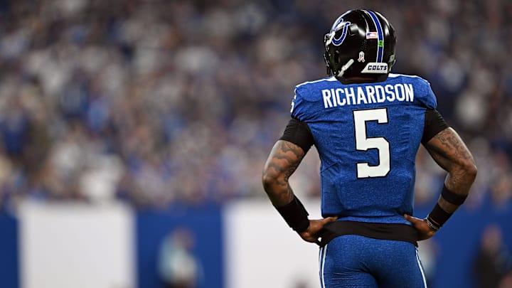 Nov 24, 2024; Indianapolis, Indiana, USA; Indianapolis Colts quarterback Anthony Richardson (5) stands on the field after a penalty is called during the second half against the Detroit Lions at Lucas Oil Stadium. Mandatory Credit: Marc Lebryk-Imagn Images