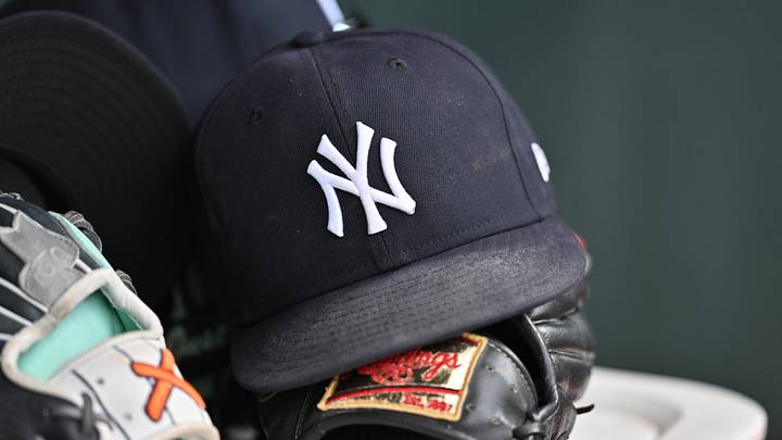 Aug 2, 2026; Chicago, Illinois, USA; A detailed view of a New York Yankees baseball hat and a glove during the eighth inning against the Chicago Cubs at Wrigley Field. Mandatory Credit: Patrick Gorski-Imagn Images Aug 2, 2026; Chicago, Illinois, USA; A detailed view of a New York Yankees baseball hat and a glove during the eighth inning against the Chicago Cubs at Wrigley Field. Mandatory Credit: Patrick Gorski-Imagn Images