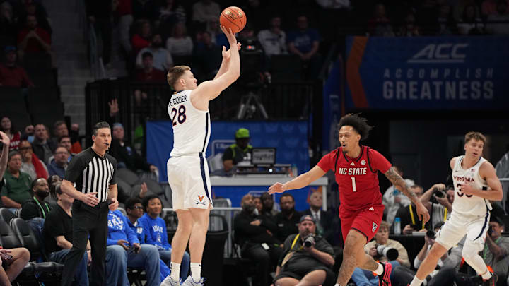 Virginia Cavaliers forward Thijs De Ridder and NC State Wolfpack forward Darrion Williams 