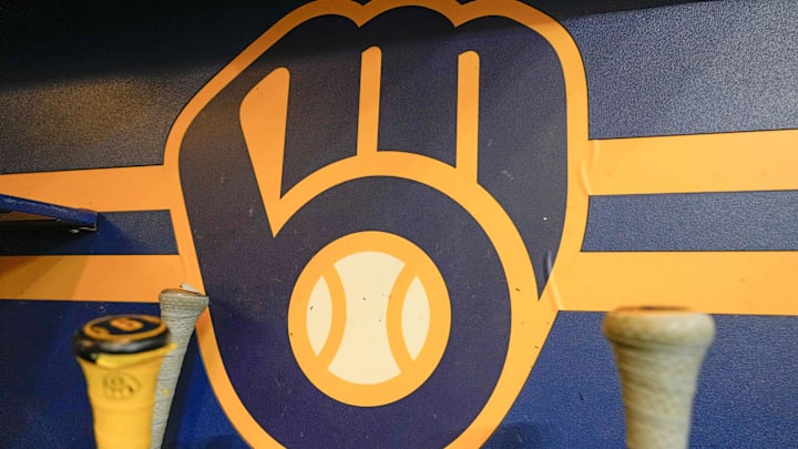 Apr 18, 2025; Milwaukee, Wisconsin, USA; General view of the Milwaukee Brewers logo in the dugout during batting practice prior to the game against the Athletics at American Family Field. Mandatory Credit: Jeff Hanisch-Imagn Images Apr 18, 2025; Milwaukee, Wisconsin, USA; General view of the Milwaukee Brewers logo in the dugout during batting practice prior to the game against the Athletics at American Family Field. Mandatory Credit: Jeff Hanisch-Imagn Images