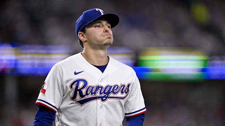 May 9, 2026; Arlington, Texas, USA; Texas Rangers starting pitcher Jack Leiter (22) comes off the field after pitching against the Chicago Cubs during the second inning at Globe Life Field. Mandatory Credit: Jerome Miron-Imagn Images