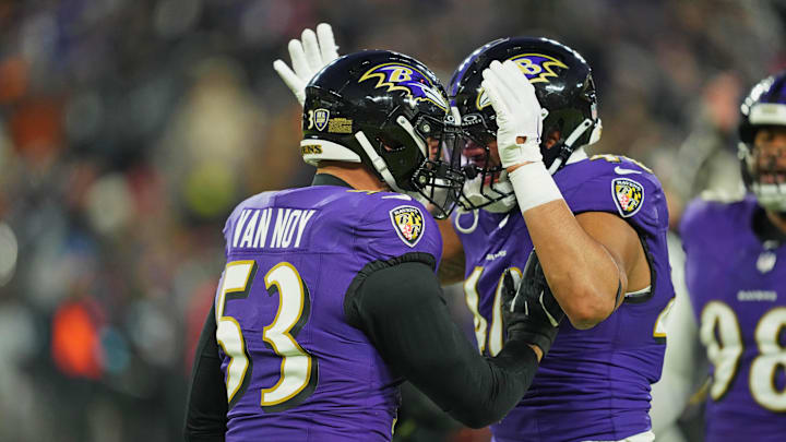 Jan 4, 2025; Baltimore, Maryland, USA; Baltimore Ravens linebacker Kyle Van Noy (53) and Baltimore Ravens defensive tackle Travis Jones (98) react after a play during the second quarter against the Cleveland Browns at M&T Bank Stadium. Mandatory Credit: Mitch Stringer-Imagn Images