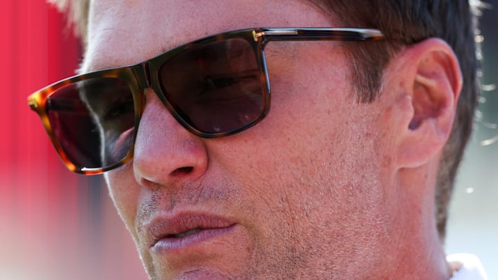 Sep 28, 2025; Tampa, Florida, USA; Fox Sports broadcaster Tom Brady looks on from the field before the game between Philadelphia Eagles and Tampa Bay Buccaneers at Raymond James Stadium. Mandatory Credit: Nathan Ray Seebeck-Imagn Images