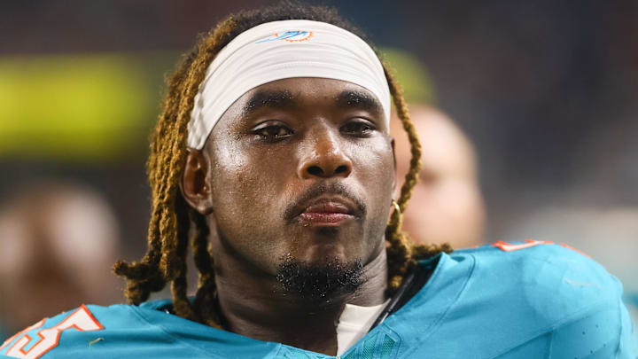Miami Dolphins center Aaron Brewer (55) looks on after the first half against the Tennessee Titans at Hard Rock Stadium.